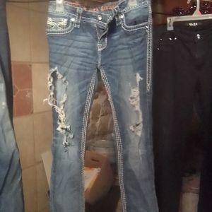 Rock rival shredded jeans